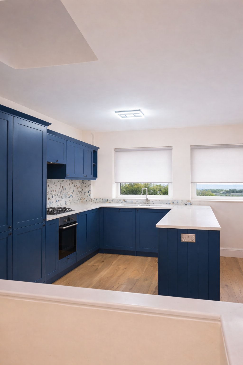 Kitchen island facing the window-side worktop