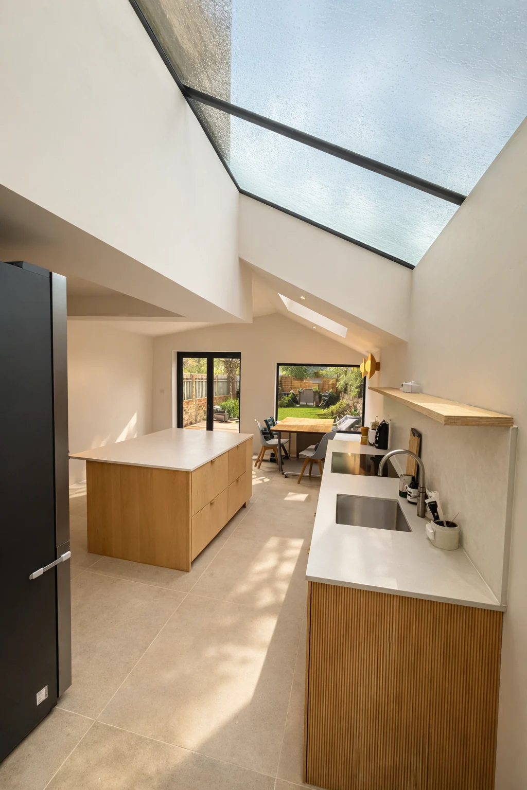Long roof glazing above the kitchen worktop