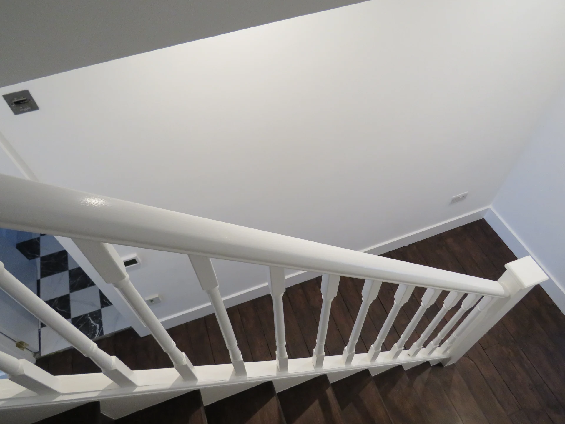 White balustrade around the upper stairwell